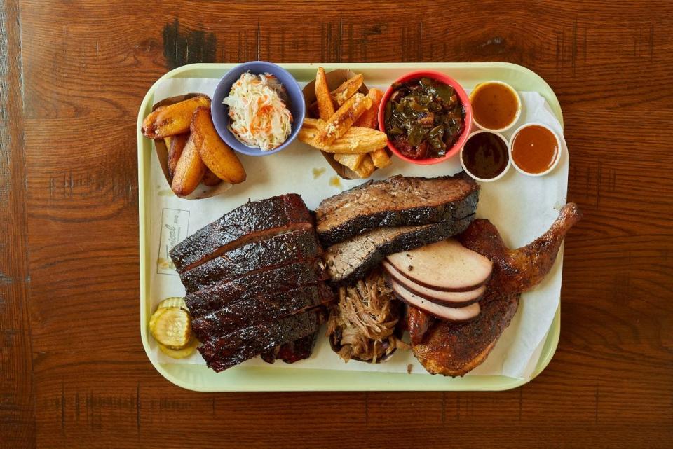 A smoky spread of menu items at Tropical Smokehouse barbecue restaurant in West Palm Beach.