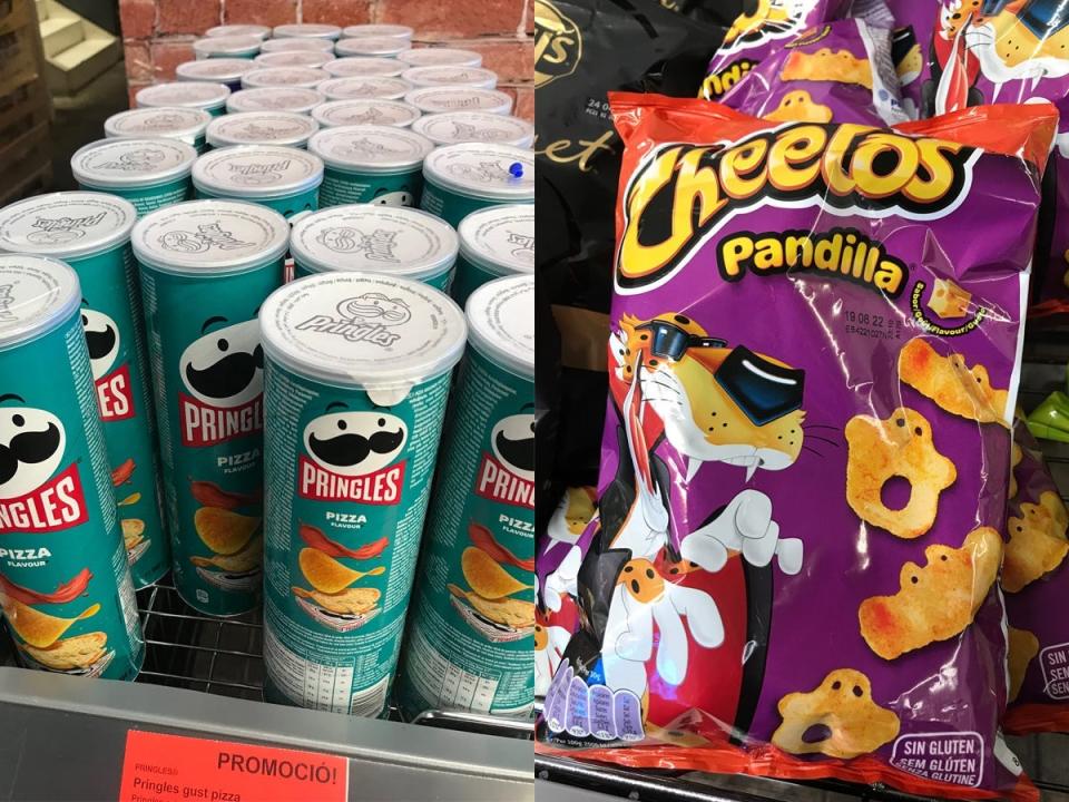 pizza Pringles and cheetos in blue and purple packages, respectively, at spanish supermarket