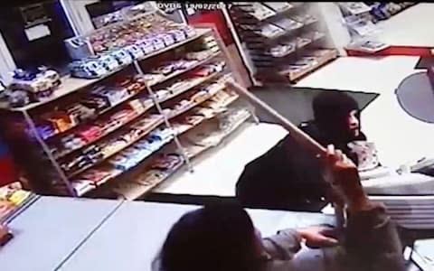 Two plucky pensioners bravely stood up to a hooded robber who tried to steal the till from their Cheltenham shop