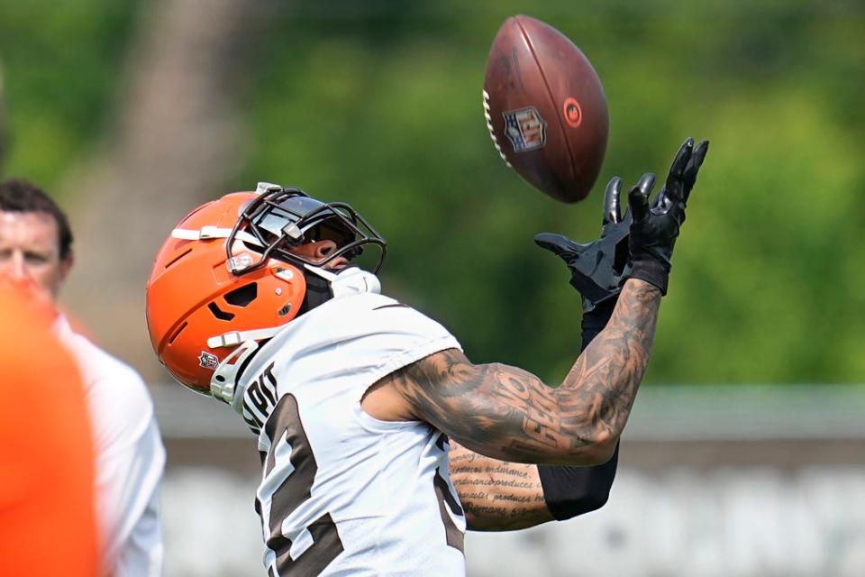 Cleveland Browns safety Grant Delpit catches a pass on May 24 in Berea.