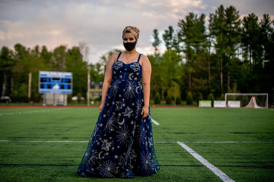 Oyster River High School student Anna Blezard, 18, poses during senior prom in Durham, New Hampshire on May 12, 2021. 