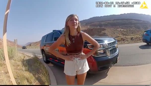 PHOTO: In this image provided by the Moab Police Department, Gabby Petito talks to a police officer after police pulled over the van she was traveling in with Brian Laundrie near the entrance to Arches National Park on Aug. 12, 2021. (Moab Police Department via AP, FILE)