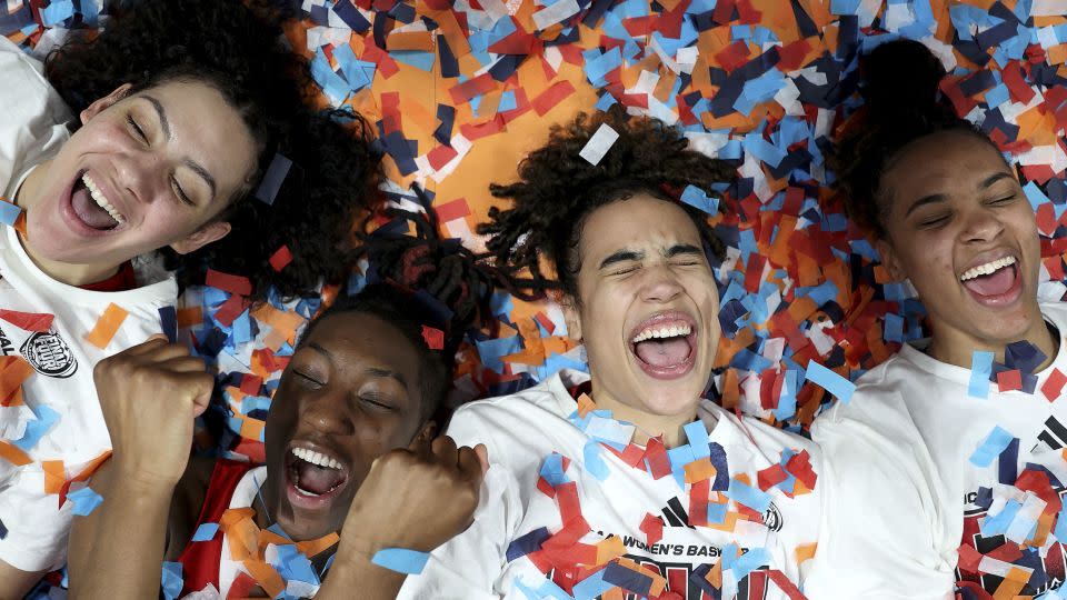 NC State Wolfpack players celebrate after defeating the Texas Longhorns. - Steph Chambers/Getty Images