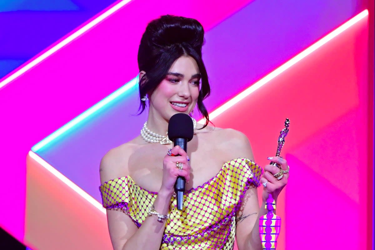 Dua Lipa accepts the award for best female solo artist at the Brit Awards 2021 at the O2 Arena, London (PA)