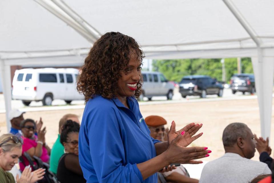 East St. Louis native and six time Olympic medalist Jackie Joyner-Kersee claps during the presentation of the new Lansdowne Park subdivision in East St. Louis, Ill. on May 4, 2024. The nonprofit Lansdowne Up built the new housing development. Nonprofit officials said they were inspired by Joyner-Kersee’s efforts to bring improvements to East St. Louis.