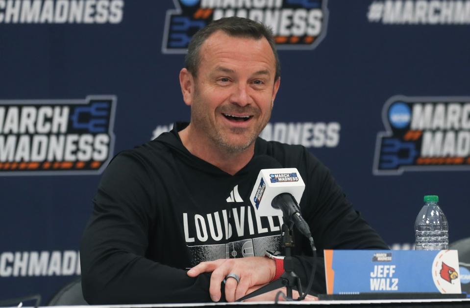 Louisville coach Jeff Walz addresses the media Thursday in Baton Rouge, Louisiana.