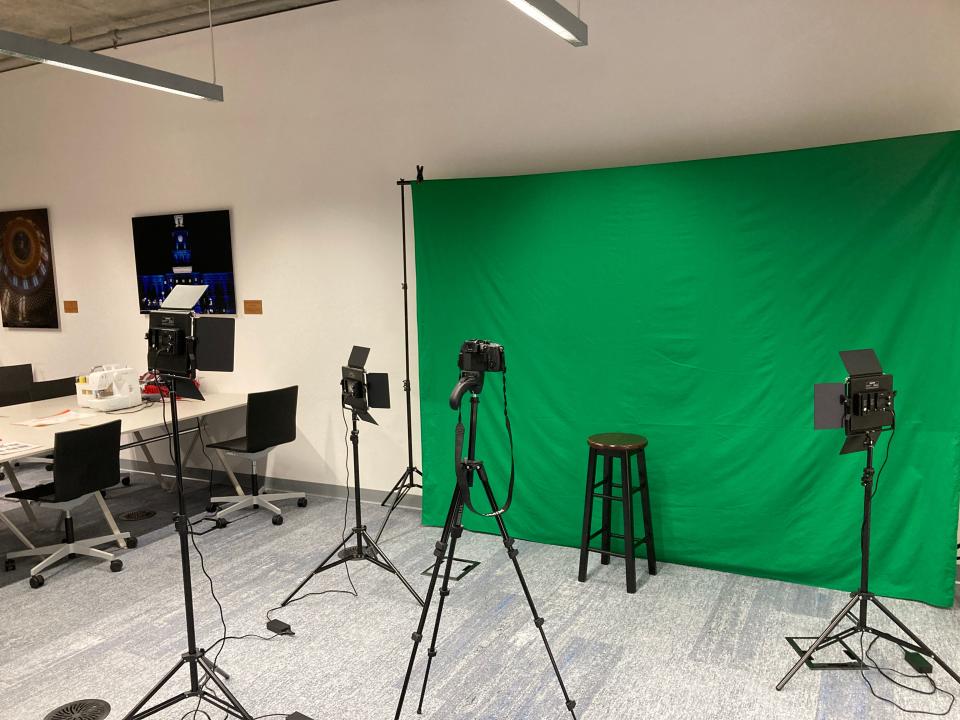 Tech Central has cameras and a green screen for filming and photography.