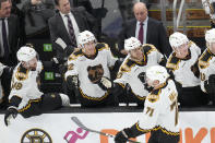 Boston Bruins left wing Taylor Hall (71) is congratulated after his goal against the Tampa Bay Lightning during the third period of an NHL hockey game, Tuesday, Nov. 29, 2022, in Boston. (AP Photo/Charles Krupa)