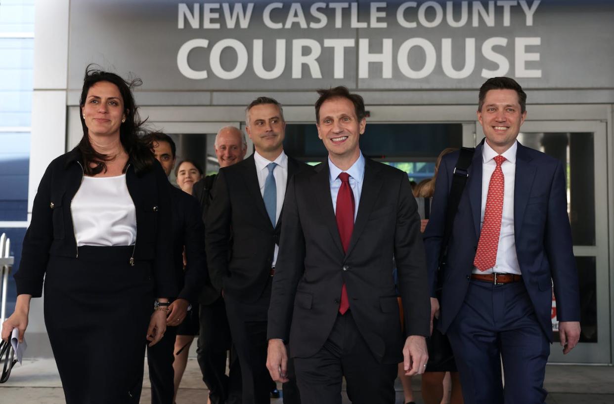 Dominion Voting Systems CEO John Poulos, third from right, leaves court with members of his legal team after reaching a reported $787.5 million settlement with Fox News. <a href="https://www.gettyimages.com/detail/news-photo/dominion-voting-systems-ceo-john-poulos-leaves-with-members-news-photo/1483128409?adppopup=true" rel="nofollow noopener" target="_blank" data-ylk="slk:Alex Wong/ Getty Images News via Getty Images;elm:context_link;itc:0;sec:content-canvas" class="link ">Alex Wong/ Getty Images News via Getty Images</a>