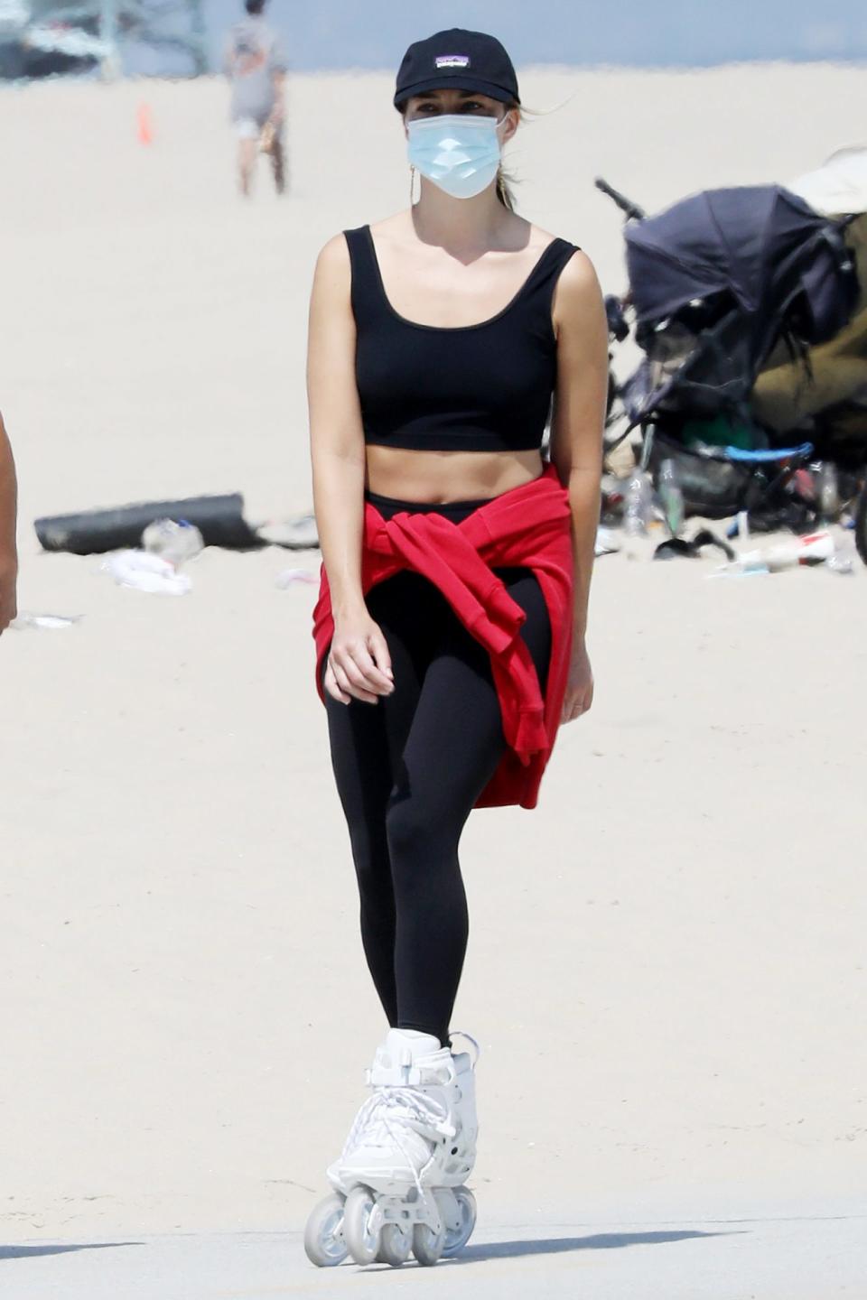 <p>Margot Robbie rollerblades with friends in Malibu on Sunday.</p>