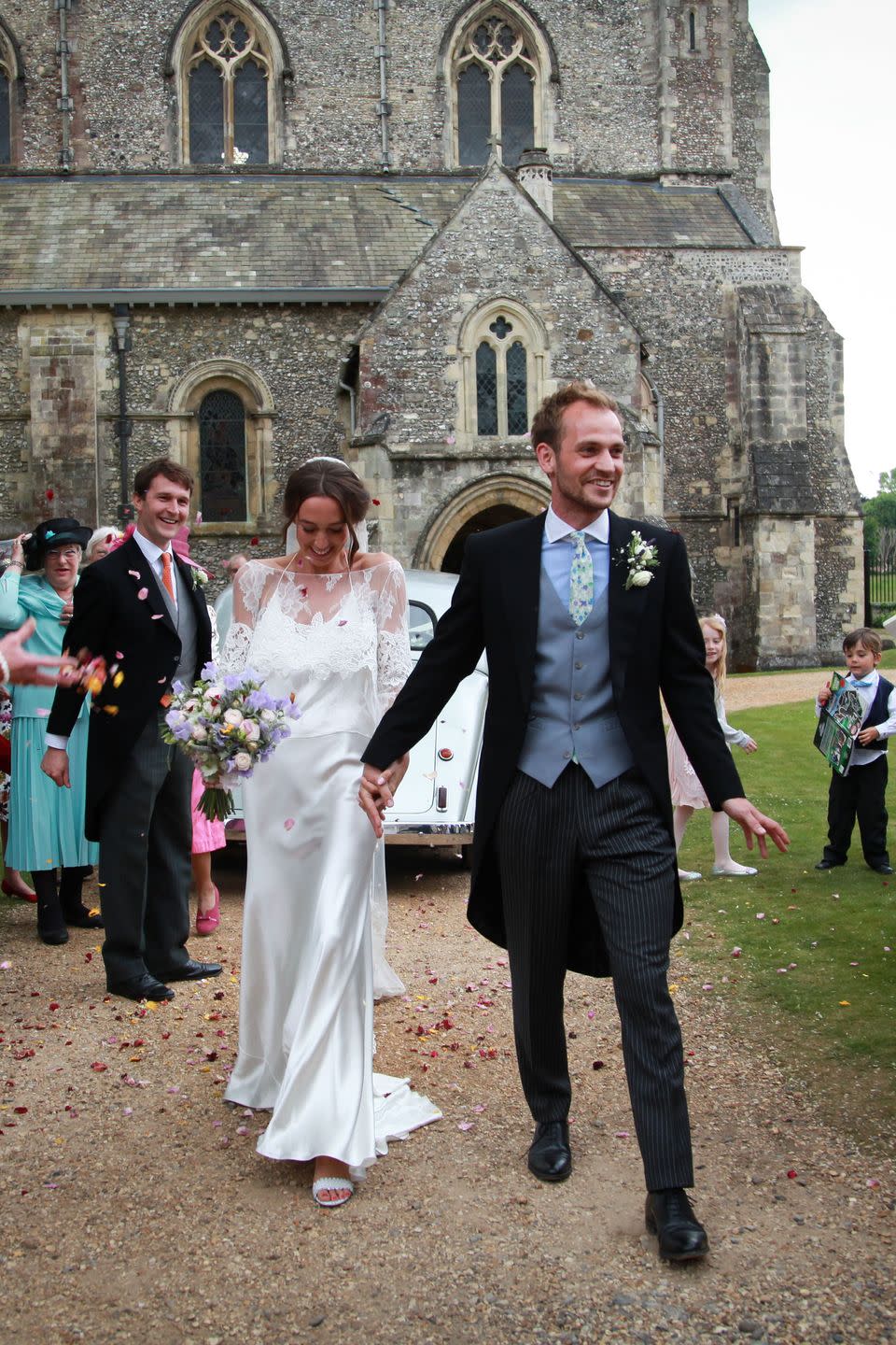 <p><strong>Wedding dress:</strong> Delphine Manivet from the Mews of Notting Hill </p><p><strong>Lace top and veil:</strong> Rime Arodaky from the Mews of Notting Hill </p><p><strong>Shoes:</strong> Tabitha Simmons</p><p><strong>Jewellery:</strong> Debbie Graham Jewellery</p>