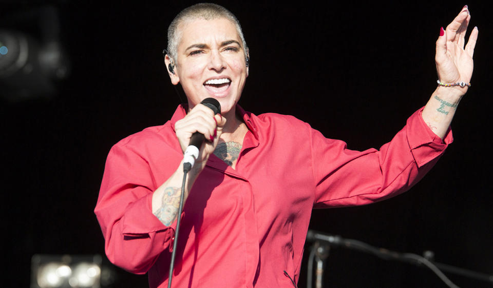 WAREHAM, ENGLAND – AUGUST 03: Sinead O’Connor performs on stage at Camp Bestival at Lulworth Castle on August 3, 2014 in Wareham, United Kingdom. (Photo by Rob Ball/Redferns via Getty Images)<cite>Rob Ball/Redferns via Getty Images</cite>