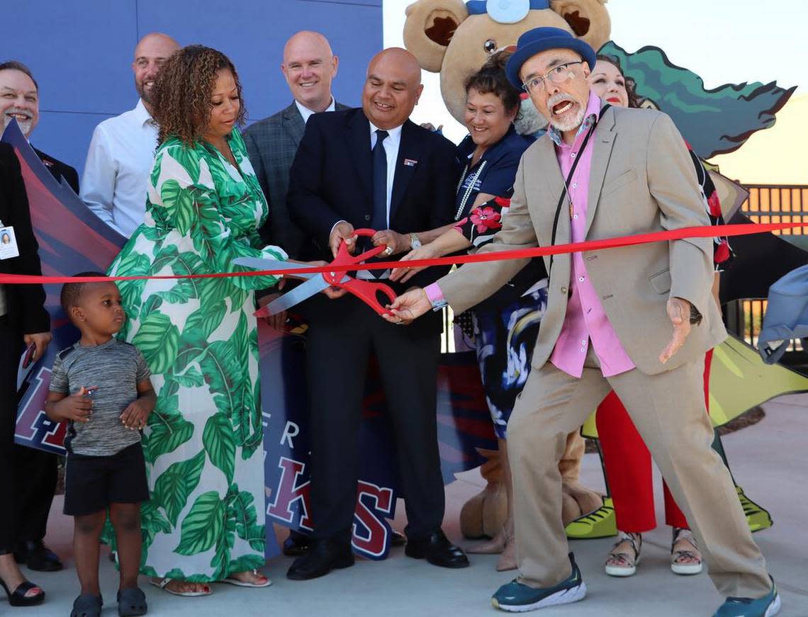 Former U.S. Poet Laureate Juan Felipe Herrera clowns around during the opening ceremonies for the elementary school named after him on Aug. 22, 2022.