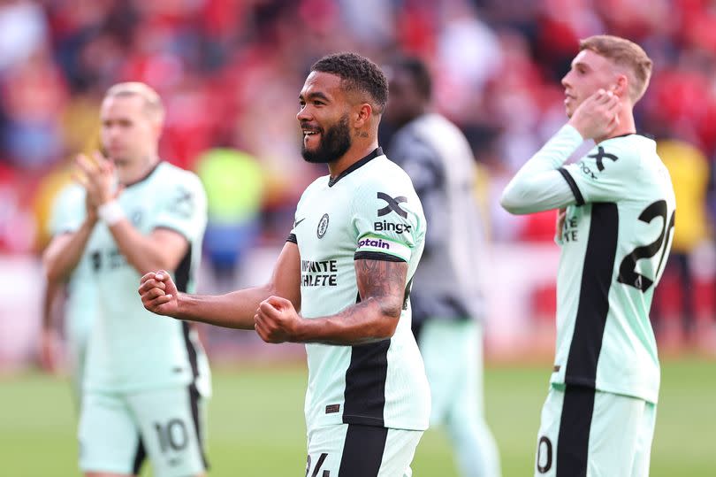 Reece James of Chelsea celebrates at full time during the Premier League match between Nottingham Forest and Chelsea FC at City Ground on May 11, 2024