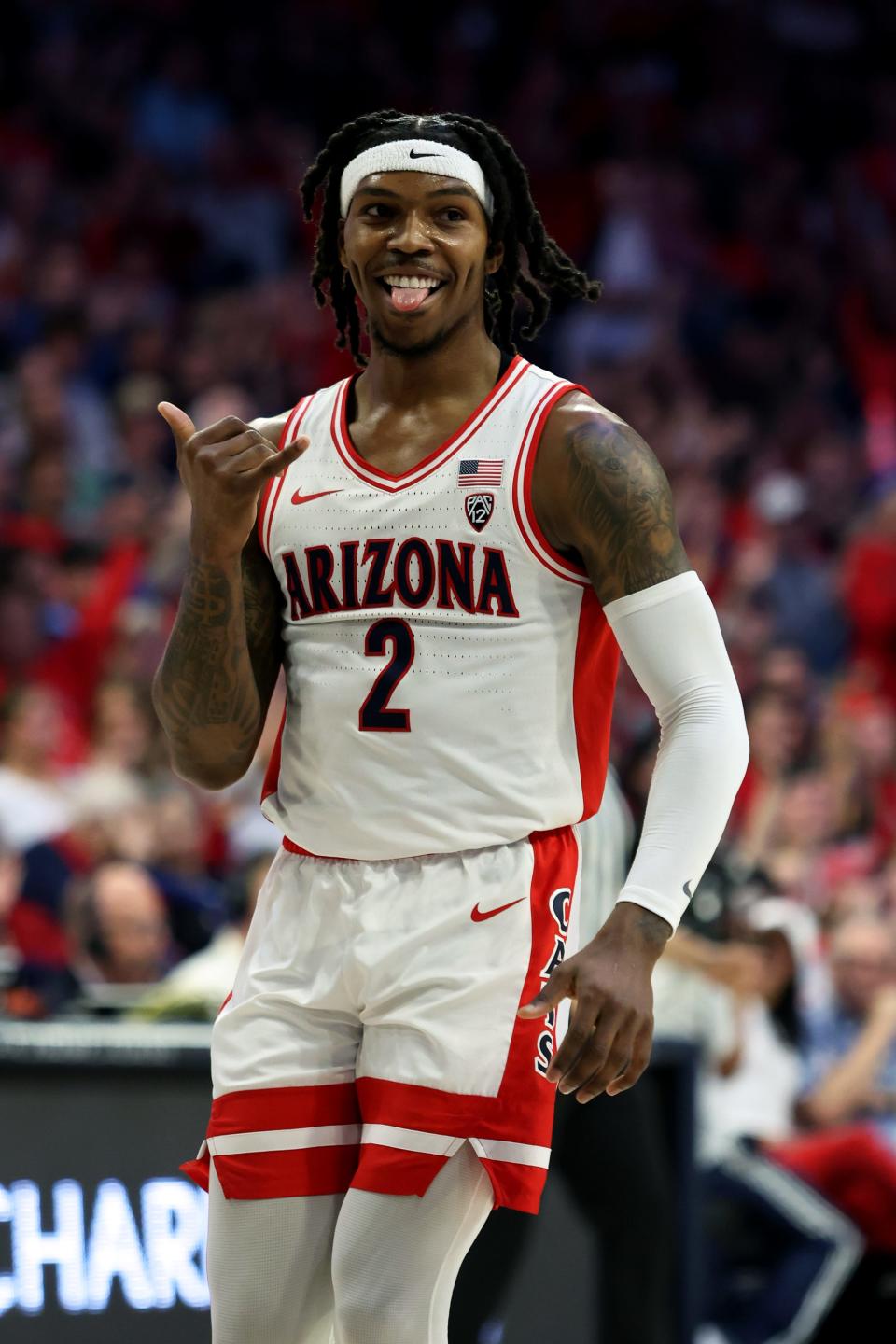 Arizona Wildcats guard Caleb Love (2) celebrates after a basket against the Washington Huskies during the first half at McKale Center.