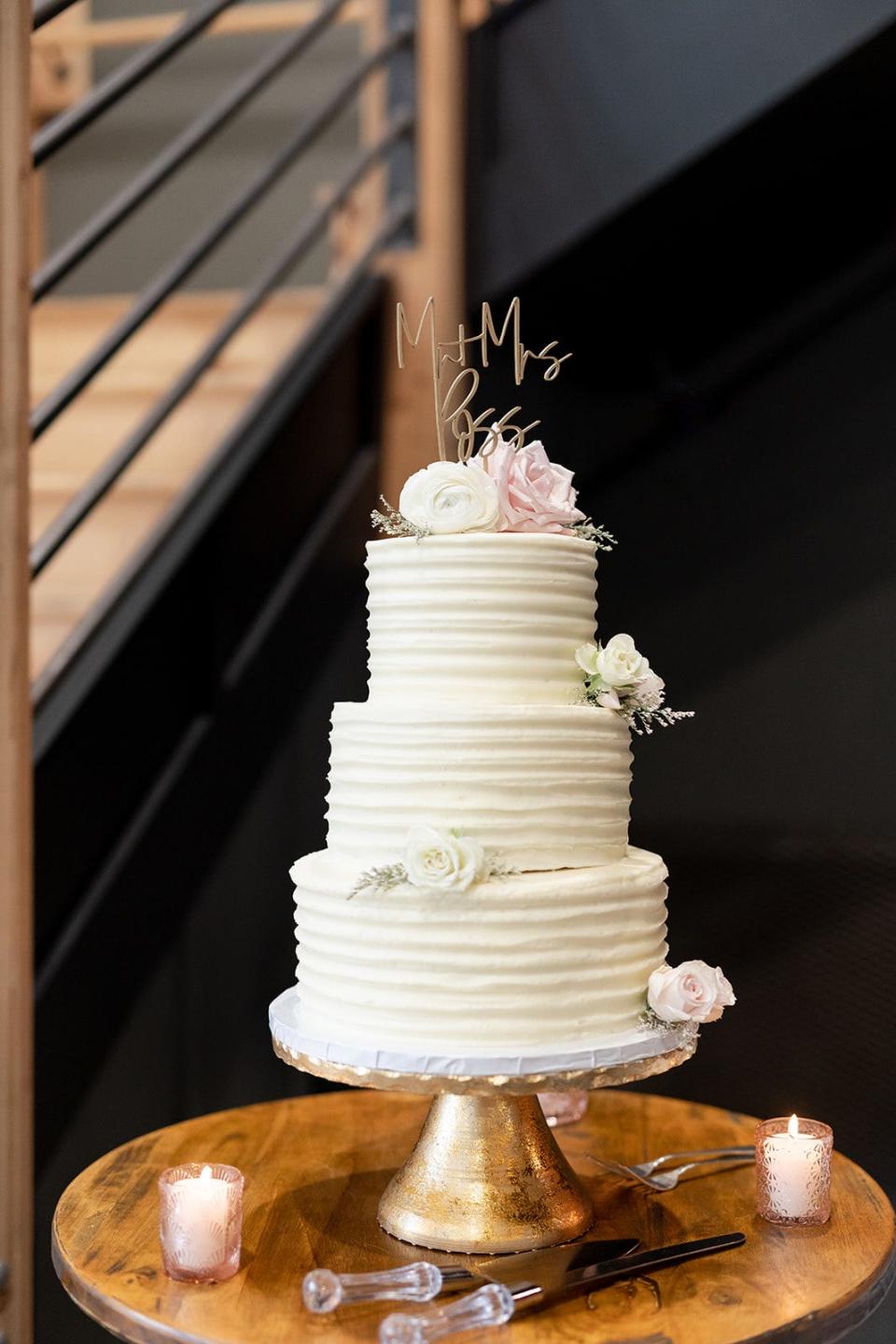 A wedding cake made by Ashlyn's Sweet Revenge.