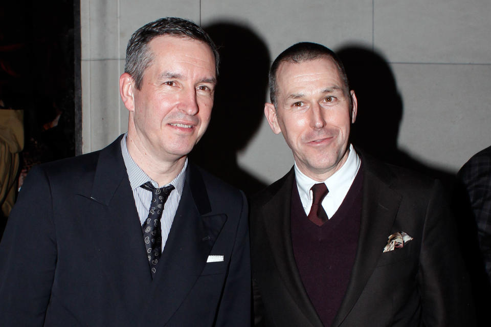 Designers Dries Van Noten, left, and Mark Lee, pose for photographers during the "Dries Van Noten Inspiration" exhibition, in Paris, Thursday, Feb.27, 2014. (AP Photo/Thibault Camus)