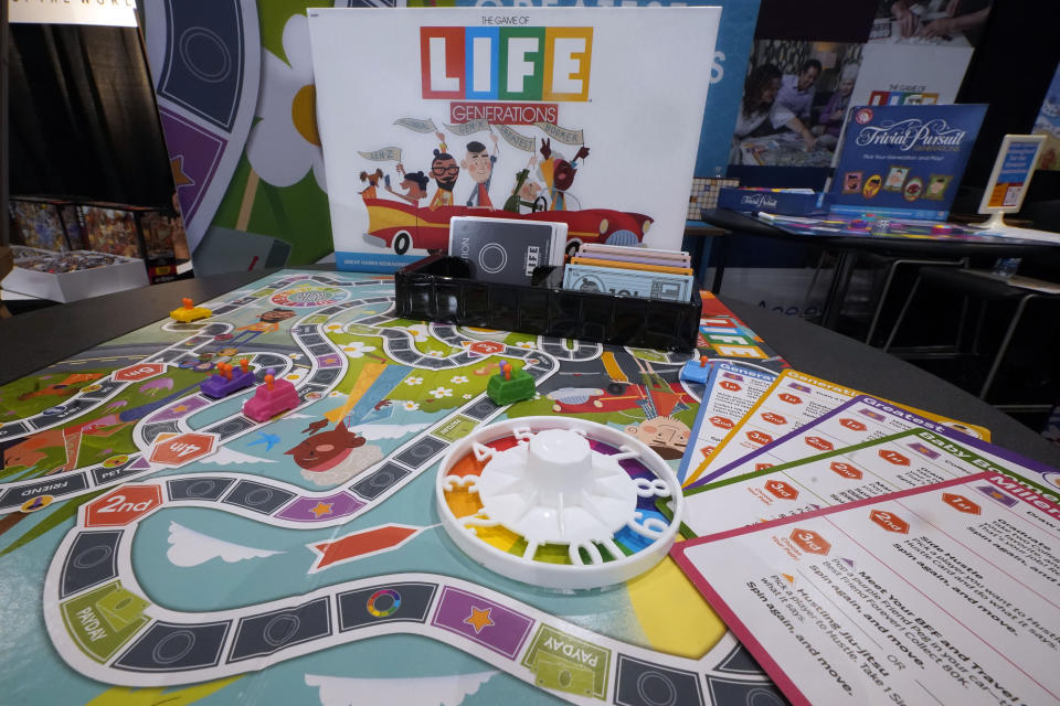 "The One of Life Generations" game is displayed at the 2023 Toy Fair, in New York's Javits Center, Monday, Oct. 2, 2023. The new “Generations” versions of Life and Trivial Pursuit have expanded their content to cater to younger and older people alike. (AP Photo/Richard Drew)