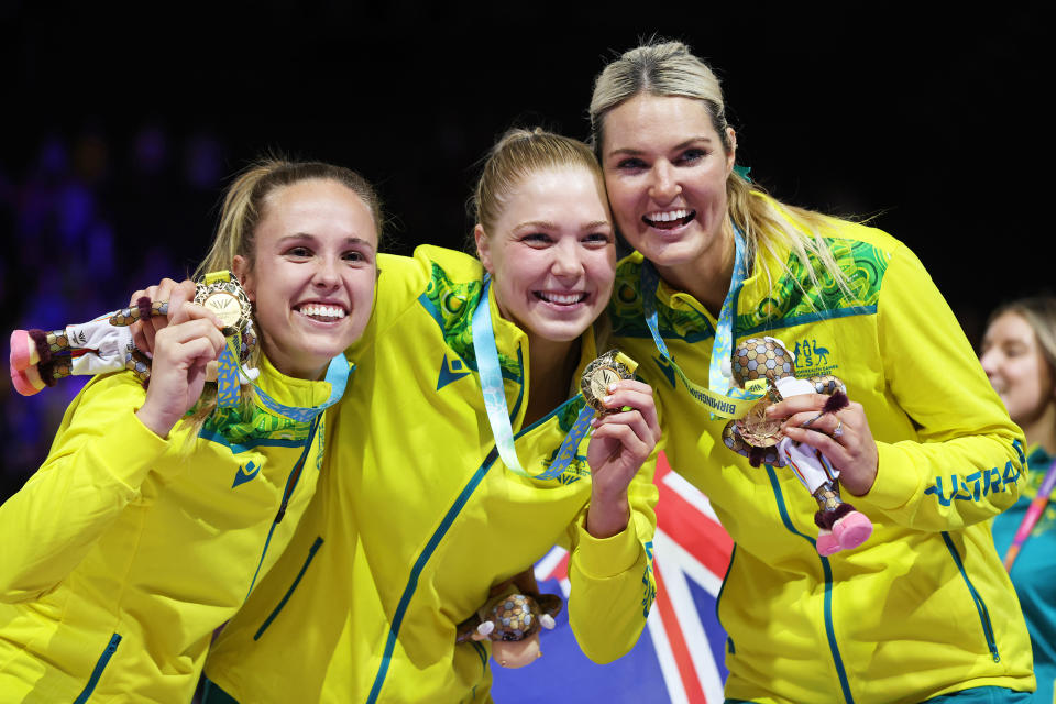 Paige Hadley, Kate Moloney and Gretel Bueta, pictured here after Australia's gold medal triumph at the 2022 Commonwealth Games.