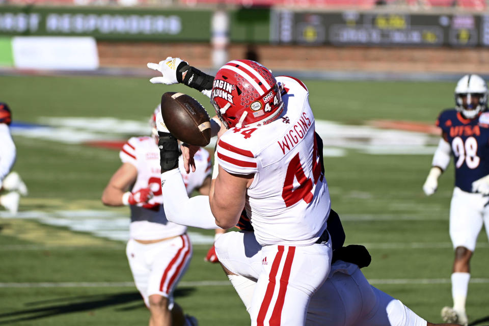 Louisiana-Lafayette linebacker Tanner Wiggins (44) can't hold on to a pass on a fake field goal in the first quarter during the First Responder Bowl NCAA college football game against UTSA in Dallas, Saturday, Dec. 26, 2020. (AP Photo/Matt Strasen)