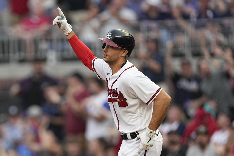Atlanta Braves first baseman Matt Olson (28) gestures as he rounds the bases after hitting a home run in the first inning of a baseball game against the Boston Red Sox Tuesday, May 9, 2023 in Atlanta. (AP Photo/John Bazemore)