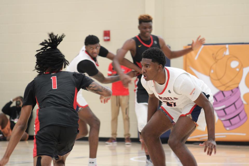 Karter Knox, right, plays defense during an AAU basketball game July 3, 2023, at the Nike EYBL Peach Jam in North Augusta, S.C. Knox has scholarship offers from Kentucky and Louisville and is the youngest brother of former Wildcats one-and-done player Kevin Knox Jr., who was selected as a lottery pick in the 2018 NBA Draft.