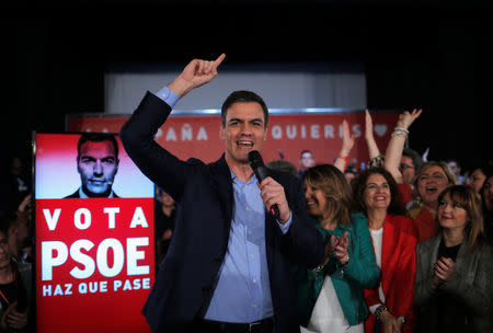 Spain's Socialist leader and current Prime Minister Pedro Sanchez gestures with supporters as they kick off their election campaign during a PSOE party meeting ahead of the April 28 general election in Dos Hermanas, near Seville, Spain April 12, 2019. REUTERS/Jon Nazca