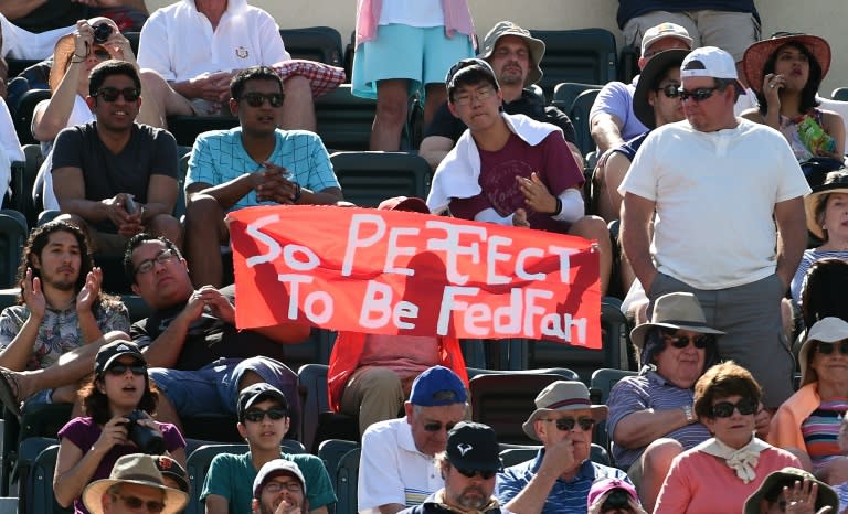 Fans cheer for Roger Federer of Switzerland during his semi final match against Jack Sock of the United States during day thirteen of the BNP Paribas Open at Indian Wells Tennis Garden on March 18, 2017