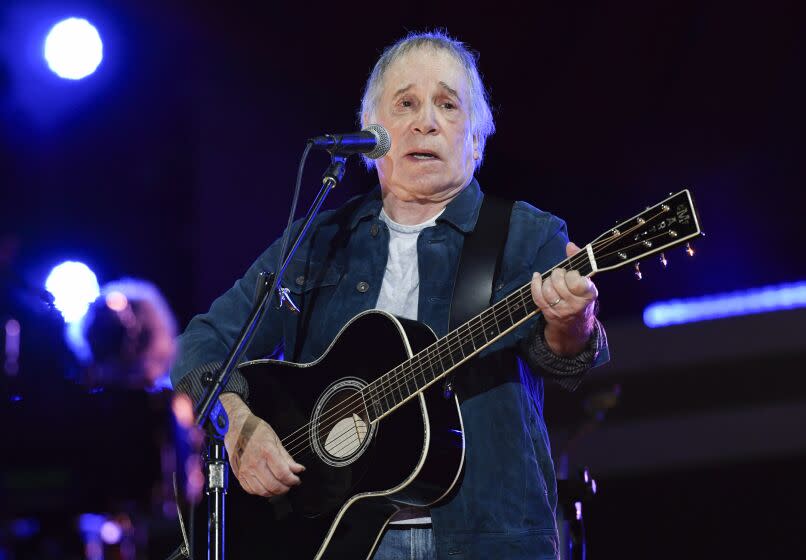 FILE - Singer-songwriter Paul Simon performs at Global Citizen Live on Sept. 25, 2021, in New York. Simon turns 80 on Oct. 13. (Photo by Evan Agostini/Invision/AP, File)