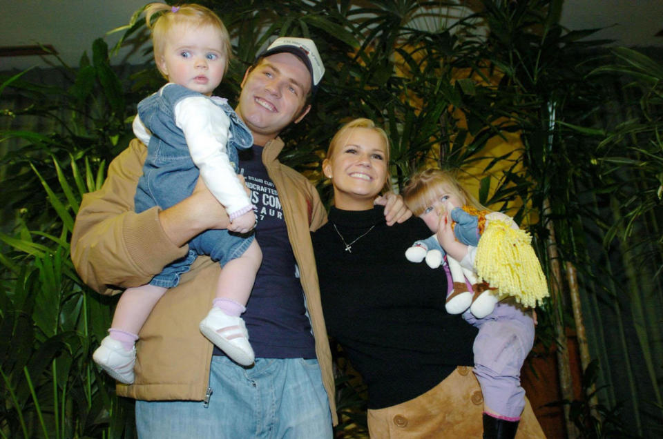 I'm A Celebrity Get Me Out of Here winner, Kerry McFadden with her husband, Westlife star, Bryan McFadden, their children, Molly one (R) and Lilly, two, (L), at a photocall at a Dublin hotel, after the couple arrived back in Ireland following Kerry's victory in the celebrity popularity contest.