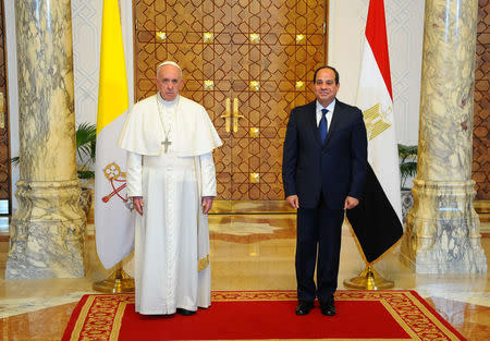 Pope Francis meeting Egypt's President Abdel Fattah al-Sisi at the Ittihadiya presidential palace in Cairo, Egypt April 28, 2017. in this handout picture courtesy of the Egyptian Presidency. The Egyptian Presidency/Handout via REUTERS