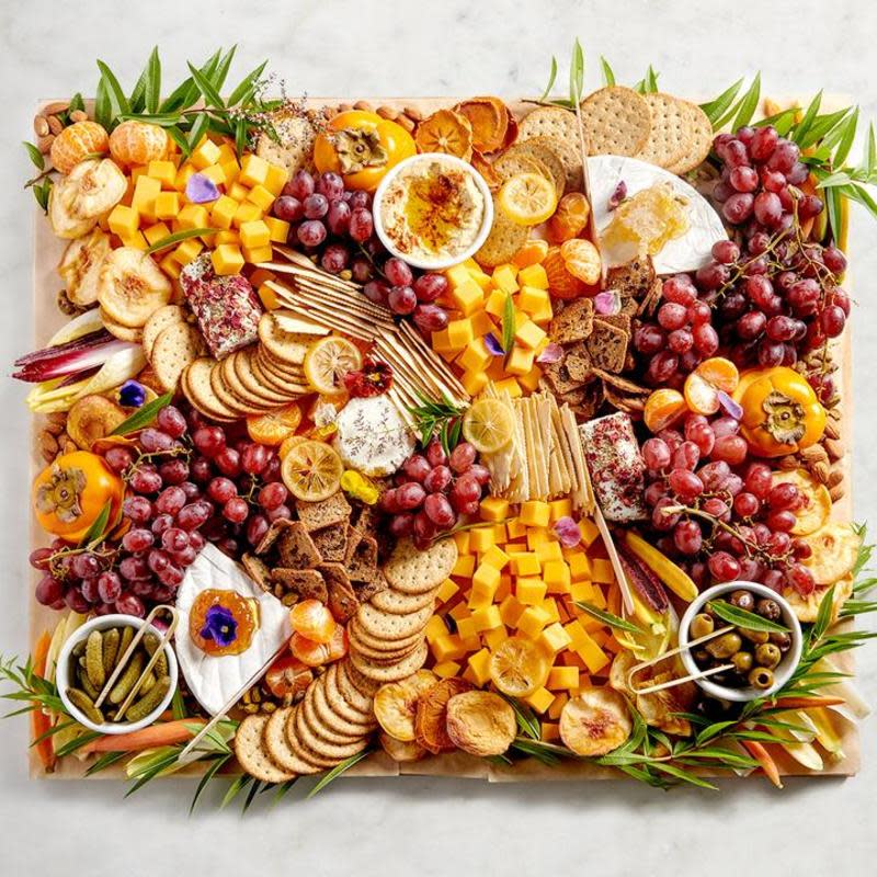 <p>Parade</p><p>There is no need to serve individual appetizers, just create a memorable and delicious party platter! </p><p><strong>Get the recipe: </strong><a href="https://parade.com/1047397/nettiemoore/how-to-make-a-grazing-board/" rel="nofollow noopener" target="_blank" data-ylk="slk:How to Make the Ultimate Grazing Board for Every Kind of Summer Soirée;elm:context_link;itc:0;sec:content-canvas" class="link rapid-noclick-resp"><strong>How to Make the Ultimate Grazing Board for Every Kind of Summer Soirée</strong></a> </p>