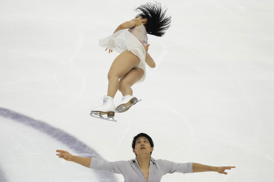Japan's Riku Miura and Ryuichi Kihara compete in the Pairs Free Skating during the figure skating Grand Prix finals at the Palavela ice arena, in Turin, Italy, Friday, Dec. 9, 2022. (AP Photo/Antonio Calanni)