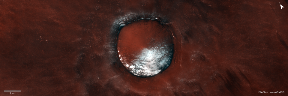A high-resolution image of a 4 km-wide crater in Mars’ north polar region, which scientists refer to as Red Velvet Mars.