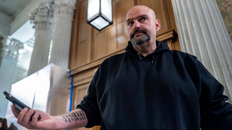 PHOTO: Sen. John Fetterman, D-Pa., arrives as the Senate holds a procedural vote on a package of wartime funding for Ukraine, Israel and other U.S. allies, at the Capitol in Washington, Friday, Feb. 9, 2024. (J. Scott Applewhite/AP, FILE)