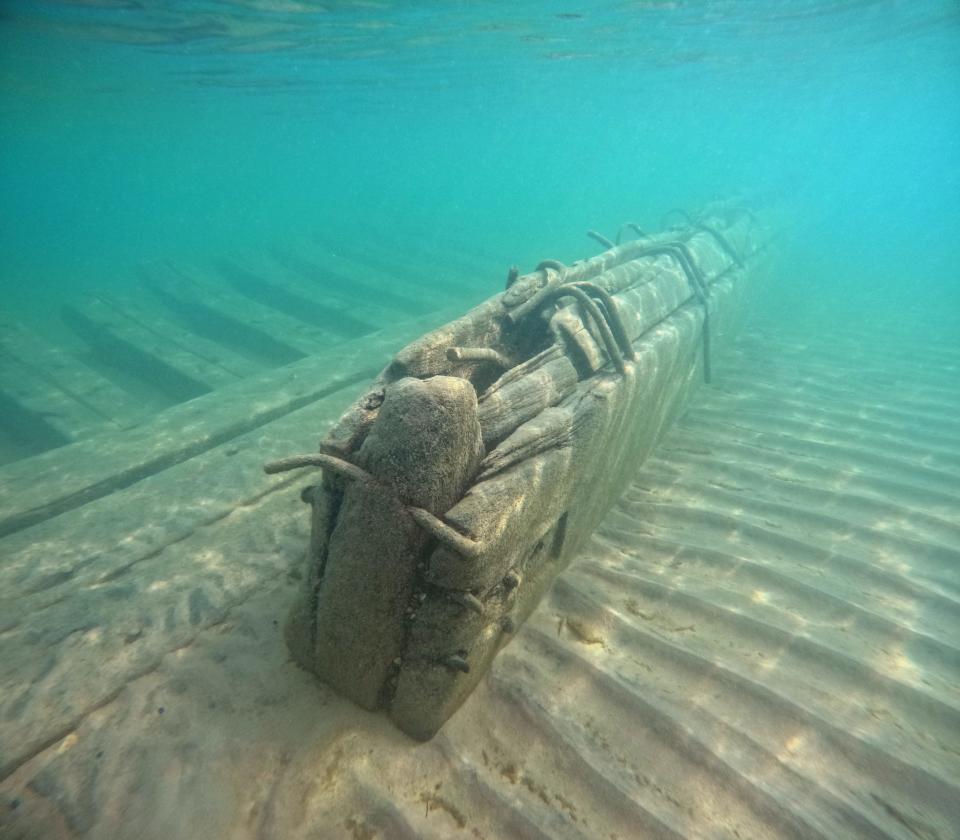 The remains of the Sassacus, one of the 13 shipwrecks discovered last year in Wisconsin's Lake Michigan waters, sit buried in the sand in Lilly Bay off of Door County.