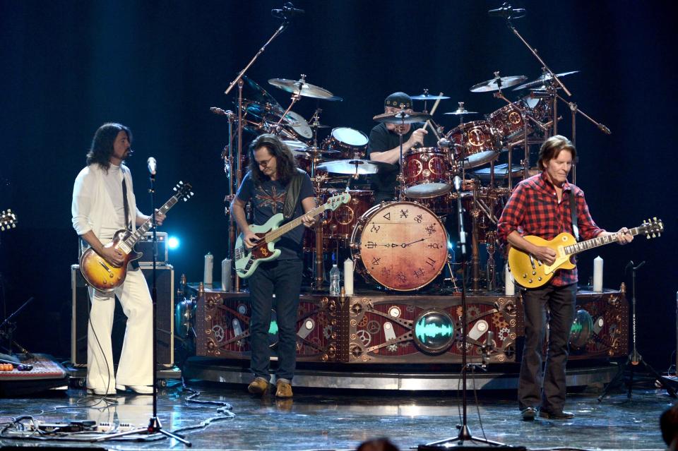 Dave Grohl performs with Rush at the Rock And Roll Hall Of Fame