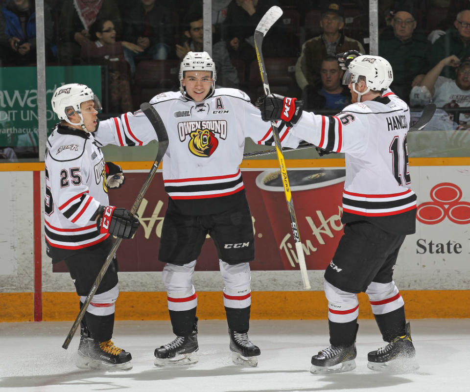 Nick Suzuki (centre) has put up some ridiculous numbers during his time in the OHL.