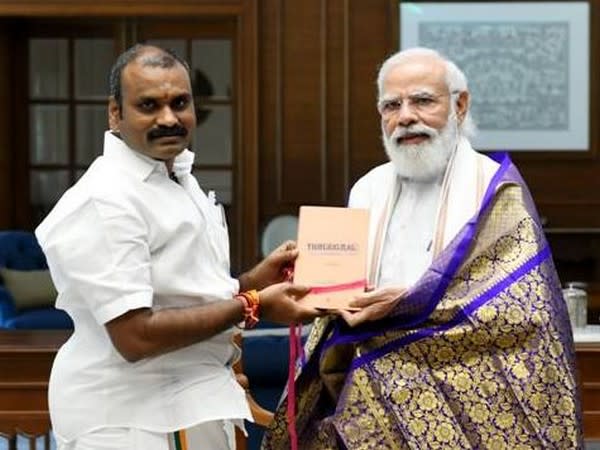 Prime Minister Narendra Modi with Union Minister of State Dr L Murugan. 