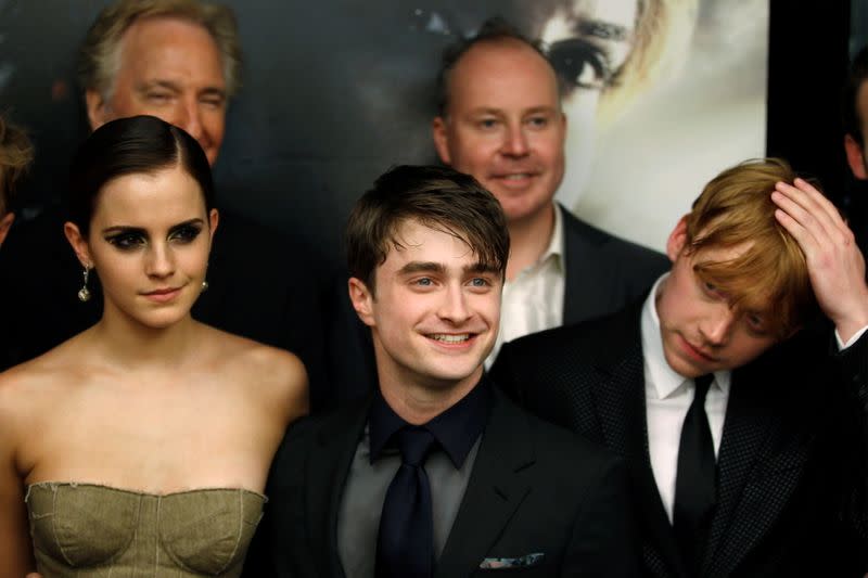 FILE PHOTO: Cast members Grint, Radcliffe and Watson arrive for premiere of the film "Harry Potter and the Deathly Hallows: Part 2" in New York