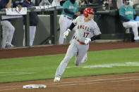 Los Angeles Angels' Shohei Ohtani rounds the bases after hitting a solo home run in the second inning of a baseball game against the Seattle Mariners, Thursday, Aug. 6, 2020, in Seattle. (AP Photo/Ted S. Warren)