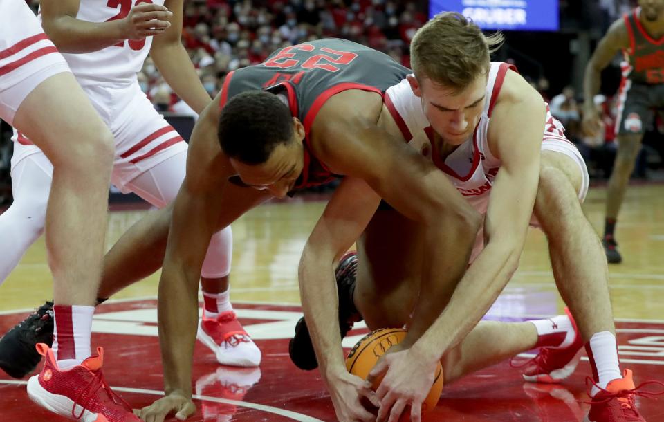 Wisconsin forward Tyler Wahl, right, has a reputation as a scrapper on the basketball court that goes back to when he was in grade school.