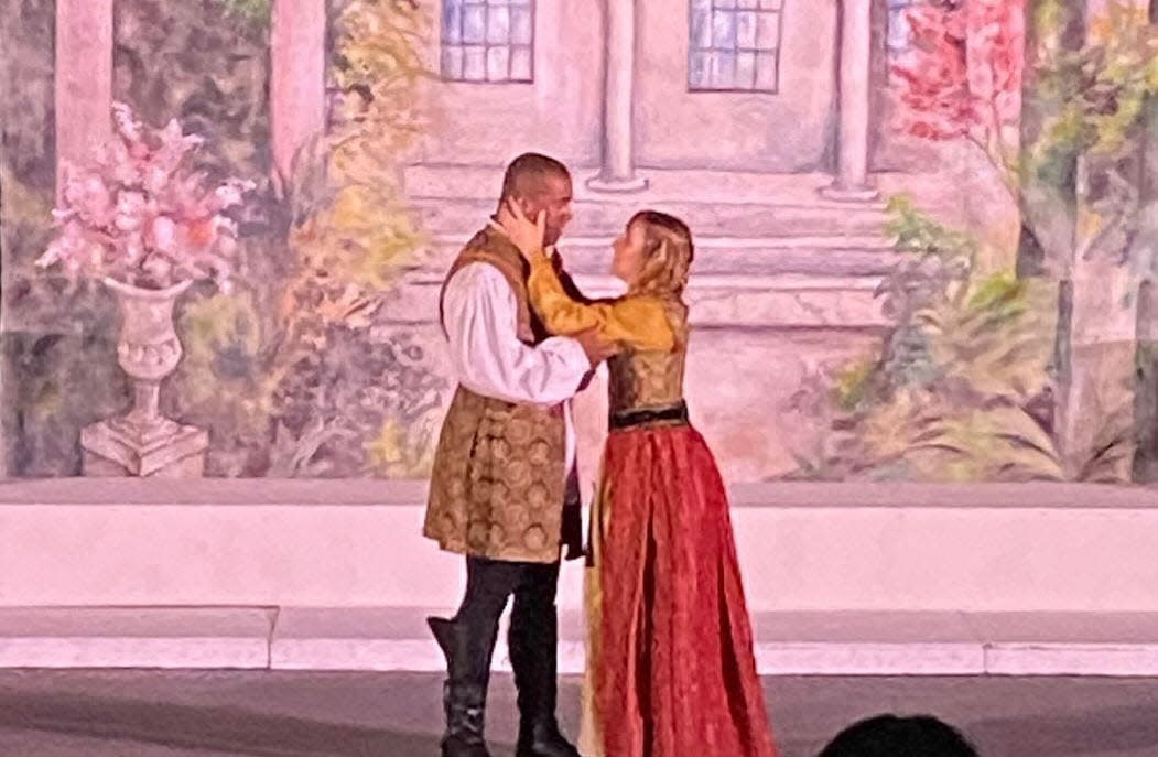 Kaleb Edward Edley as Benedick and Morganna Bridgers as Beatrice in Cape Fear Shakespeare's comedy "Much Ado About Nothing" at Greenfield Lake Amphitheater.