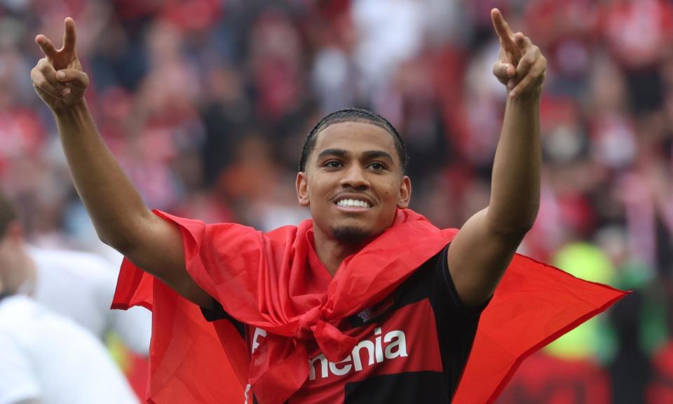 <span>Amine Adli celebrates the completion of Bayer Leverkusen’s unbeaten season at Augsburg. His side seek another trophy on Wednesday when they face Atalanta in Dublin.</span><span>Photograph: Christopher Neundorf/EPA</span>