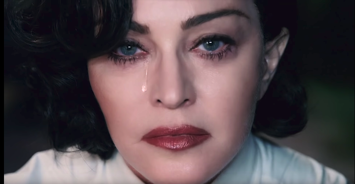 Madonna weeps for gun violence victims in her powerful new "God Control" video. (Photo: Interscope)