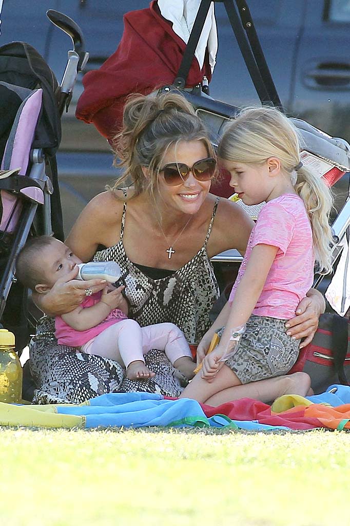 After the adoption of baby Eloise over the summer, actress Denise Richards' brood comprised a trio of little girls, including big sisters (with ex-huband Charlie Sheen) Sam, 7, and Lola, 6, but it didn't come together easily. "Some people think if a celebrity wants a baby, they get one the next day," Richards revealed to <i>Us Weekly</i>. "The adoption took two years, and there were times I felt discouraged, times when I got close to adopting a baby and it fell through. But I knew the right baby would find us." Looks like she did!