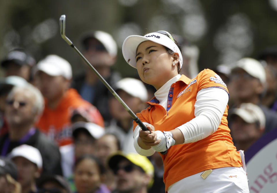 Jenny Shin follows her shot from the third tee of Lake Merced Golf Club during the final round of the Swinging Skirts LPGA Classic golf tournament on Sunday, April 27, 2014, in Daly City, Calif. (AP Photo/Eric Risberg)