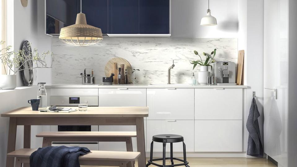 <p>Cool tones are perfect for a clean and simple kitchen. A high gloss white, with a deep blue or forest green, pairs perfectly with light, natural woods. Keep your lines clean and use accessories sparingly – this is a very easy scheme to do well, and within a tight budget. </p><p>Pictured: <a href="https://go.redirectingat.com?id=127X1599956&url=https%3A%2F%2Fwww.ikea.com%2Fgb%2Fen%2Fp%2Fringhult-drawer-front-high-gloss-white-30205104%2F&sref=https%3A%2F%2Fwww.housebeautiful.com%2Fuk%2Fdecorate%2Fkitchen%2Fg37409102%2Fwhite-kitchen%2F" rel="nofollow noopener" target="_blank" data-ylk="slk:Ringhult Kitchen Cabinets at IKEA;elm:context_link;itc:0;sec:content-canvas" class="link ">Ringhult Kitchen Cabinets at IKEA</a></p>