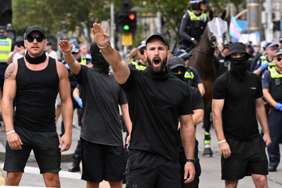 Neo-Nazi leader Thomas Sewell (centre) is seen as Neo nazi and Transgender rights supporters face off at the demonstration. Source: AAP