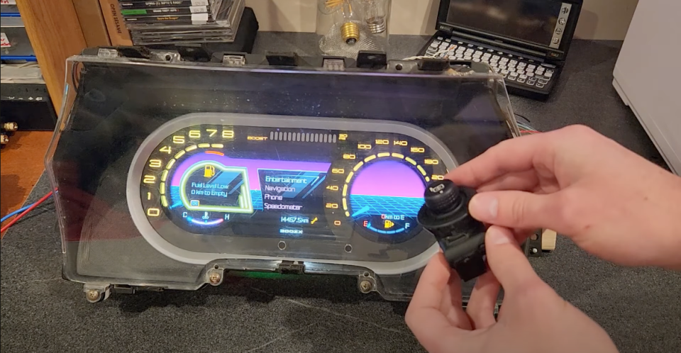 Elsner used this Ford mirror control as a joystick, or mouse, so a user can cycle through menus. <em><u>Blitzen Design Lab</u>/YouTube</em>